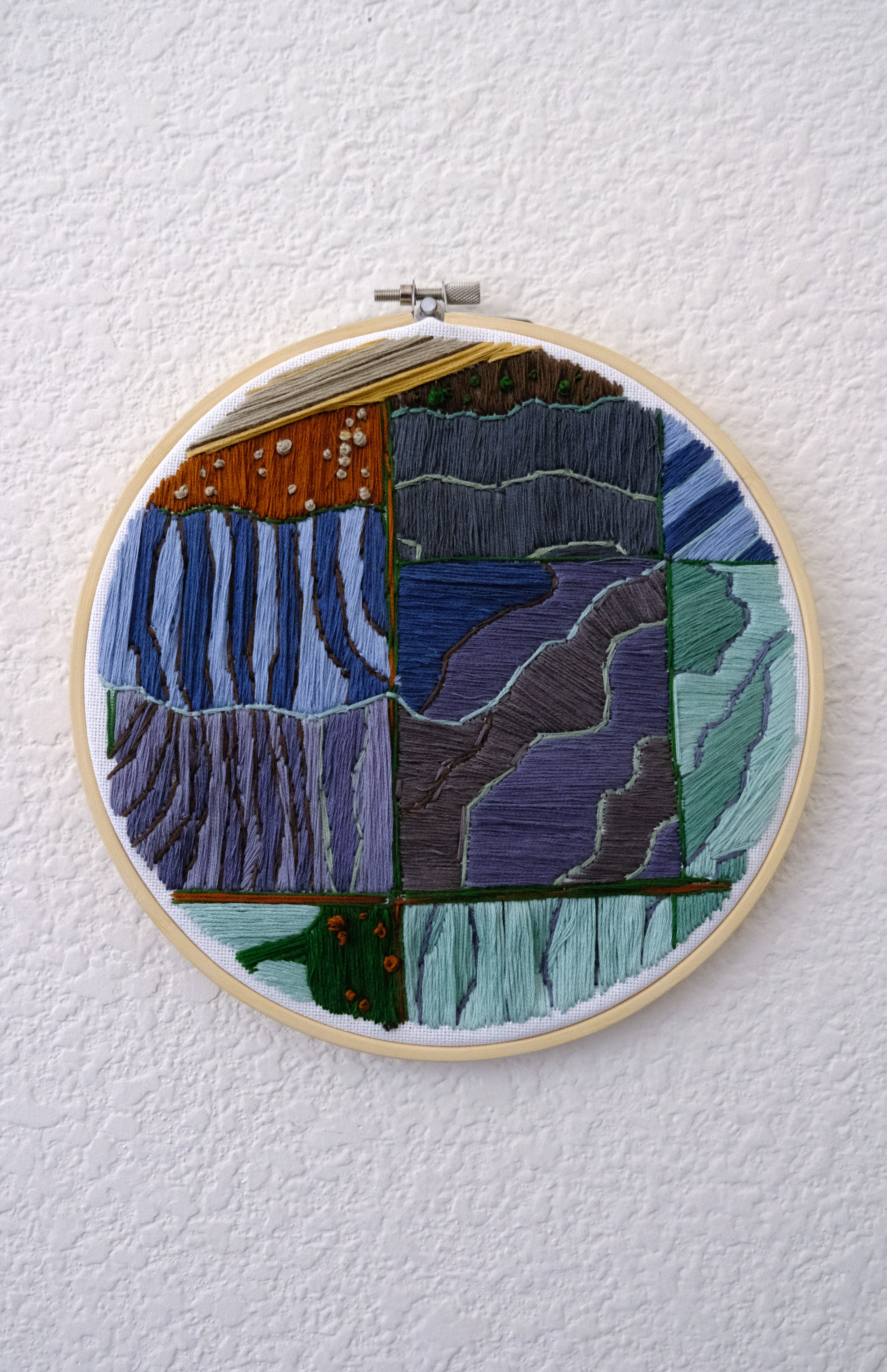 embroidery hoop depicting the yolo basin in flooded state