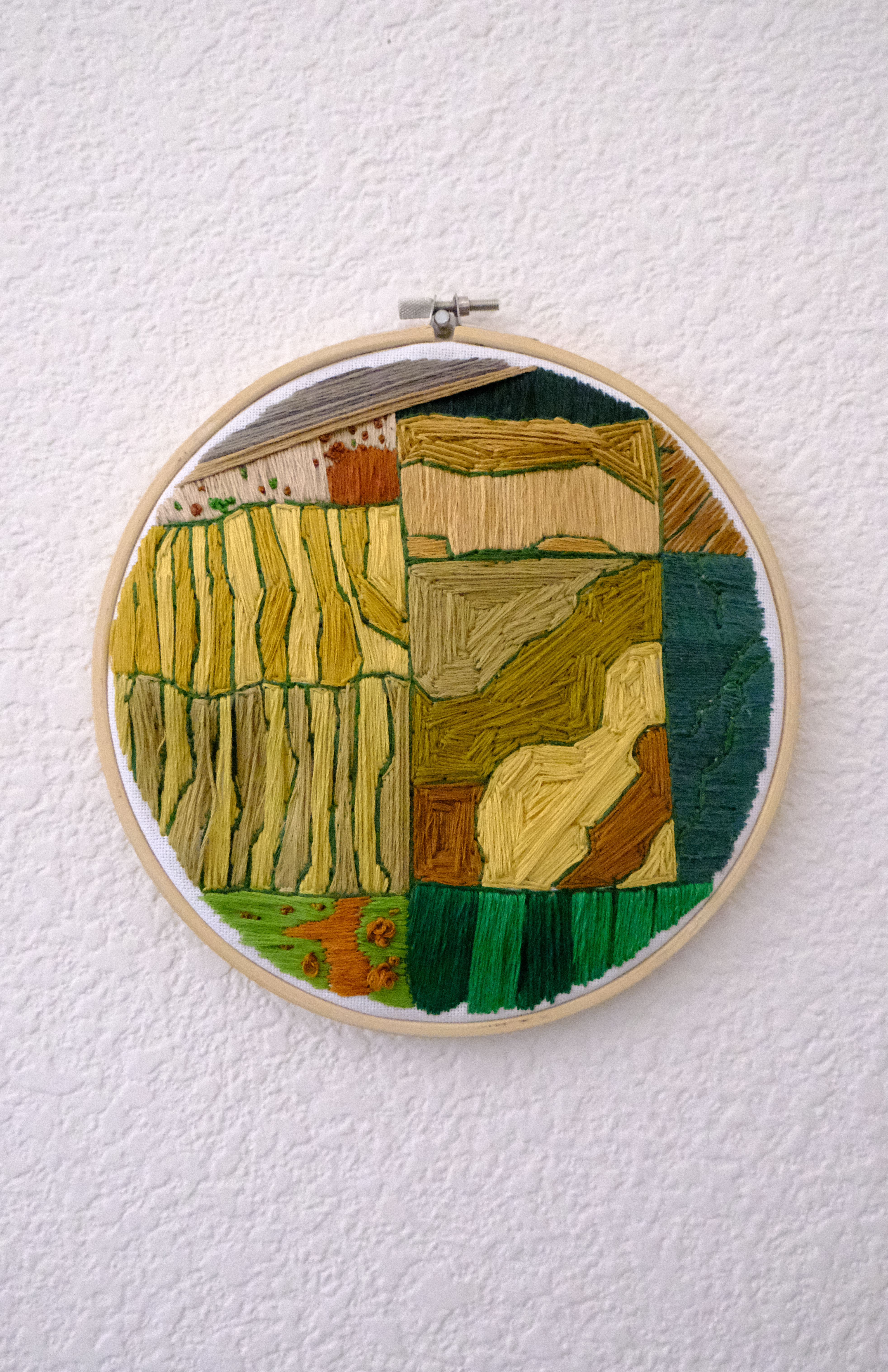 embroidery hoop depicting the yolo basin in agricultural state