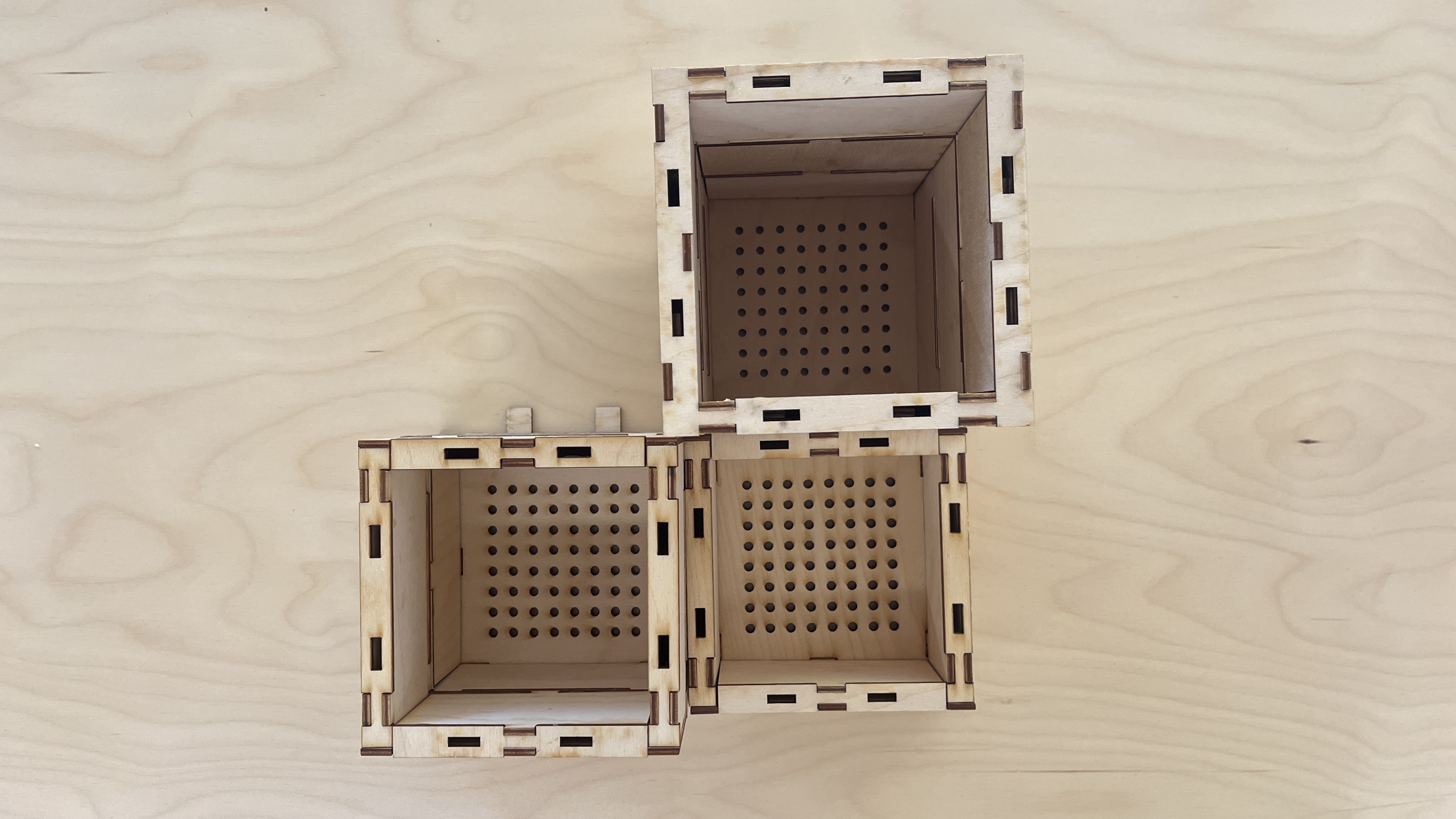 three modules at different heights connected together from above