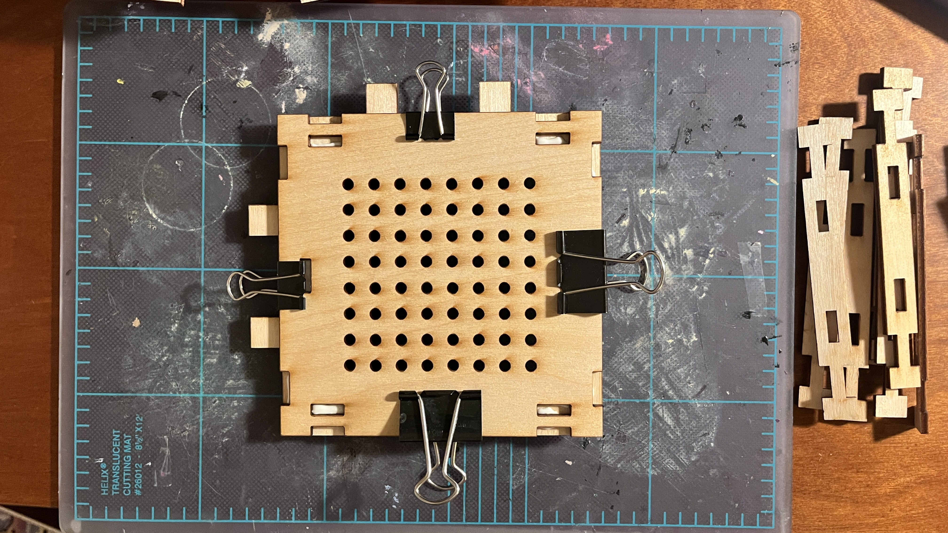 glueing down a drainage module to the base
