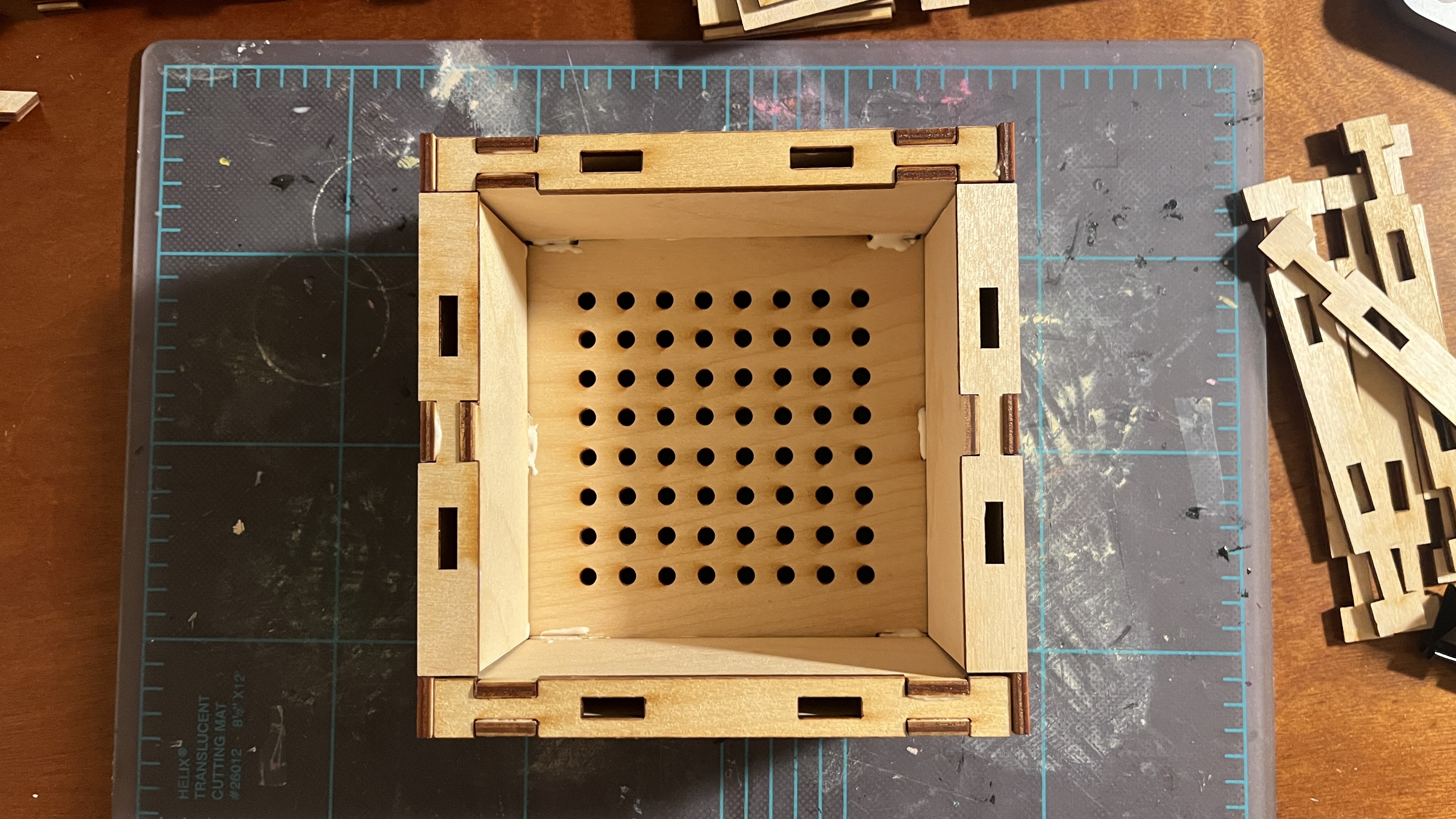 slotting together walls to the base of the planter